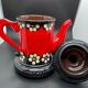 Vintage terracotta teapot glazed and hand painted