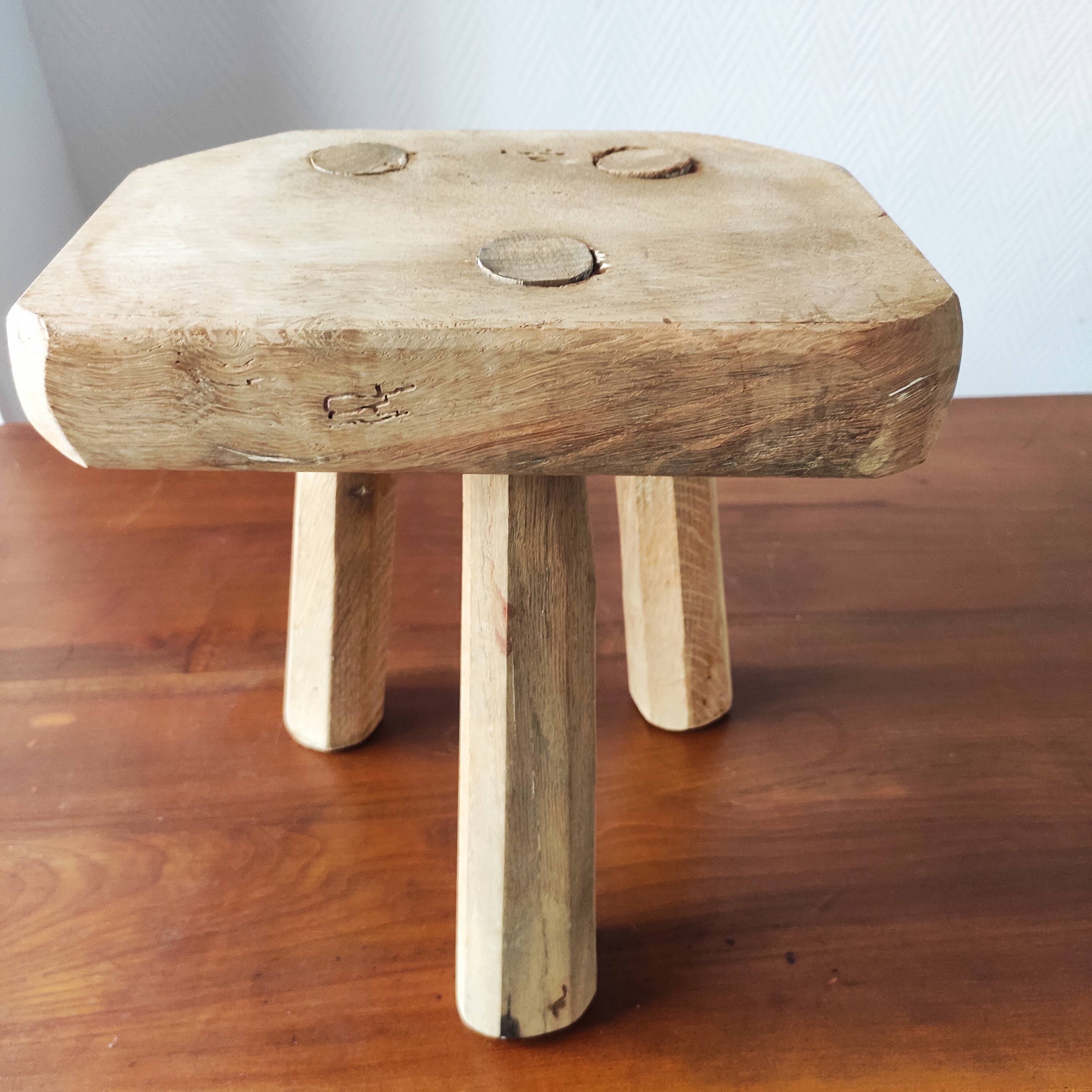 Vintage Danish brutalist tripod stool made of solid oak.