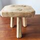 Vintage Danish brutalist tripod stool made of solid oak.