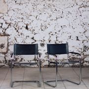 Pair of Bauhaus cantilever armchairs in chromed metal and leather, 1970