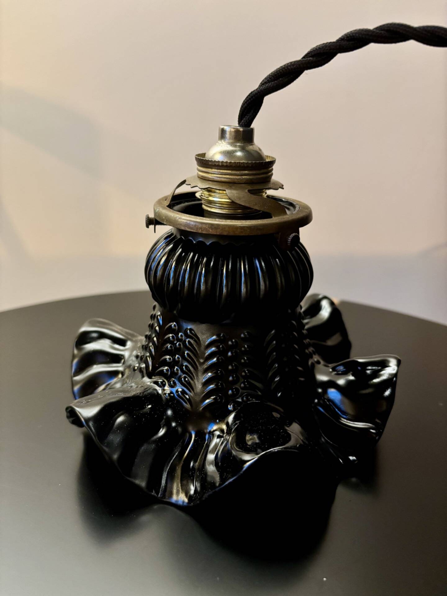 Black moulded glass lamp