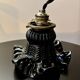 Black moulded glass lamp