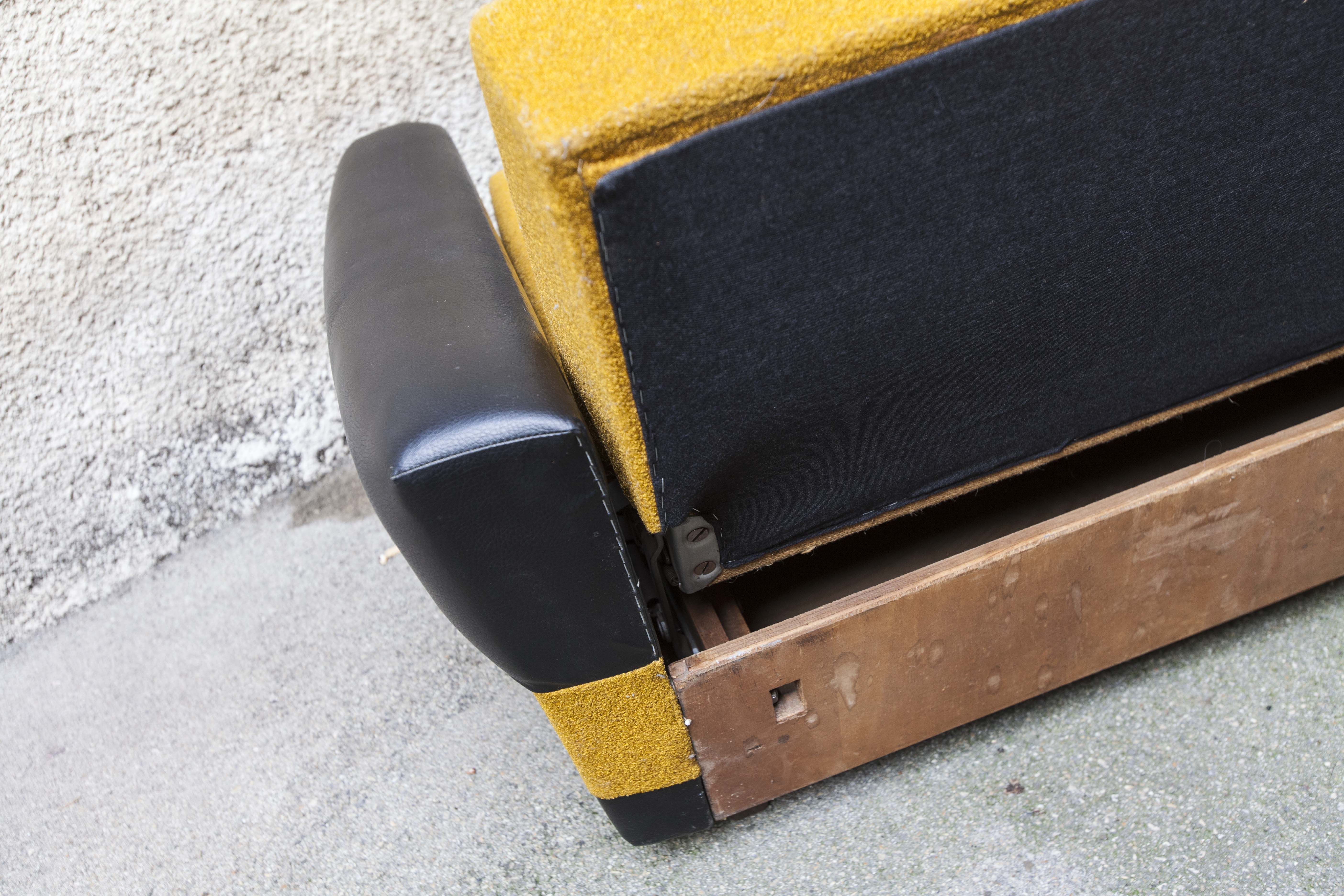 The 1970s gold and black Daybed couch