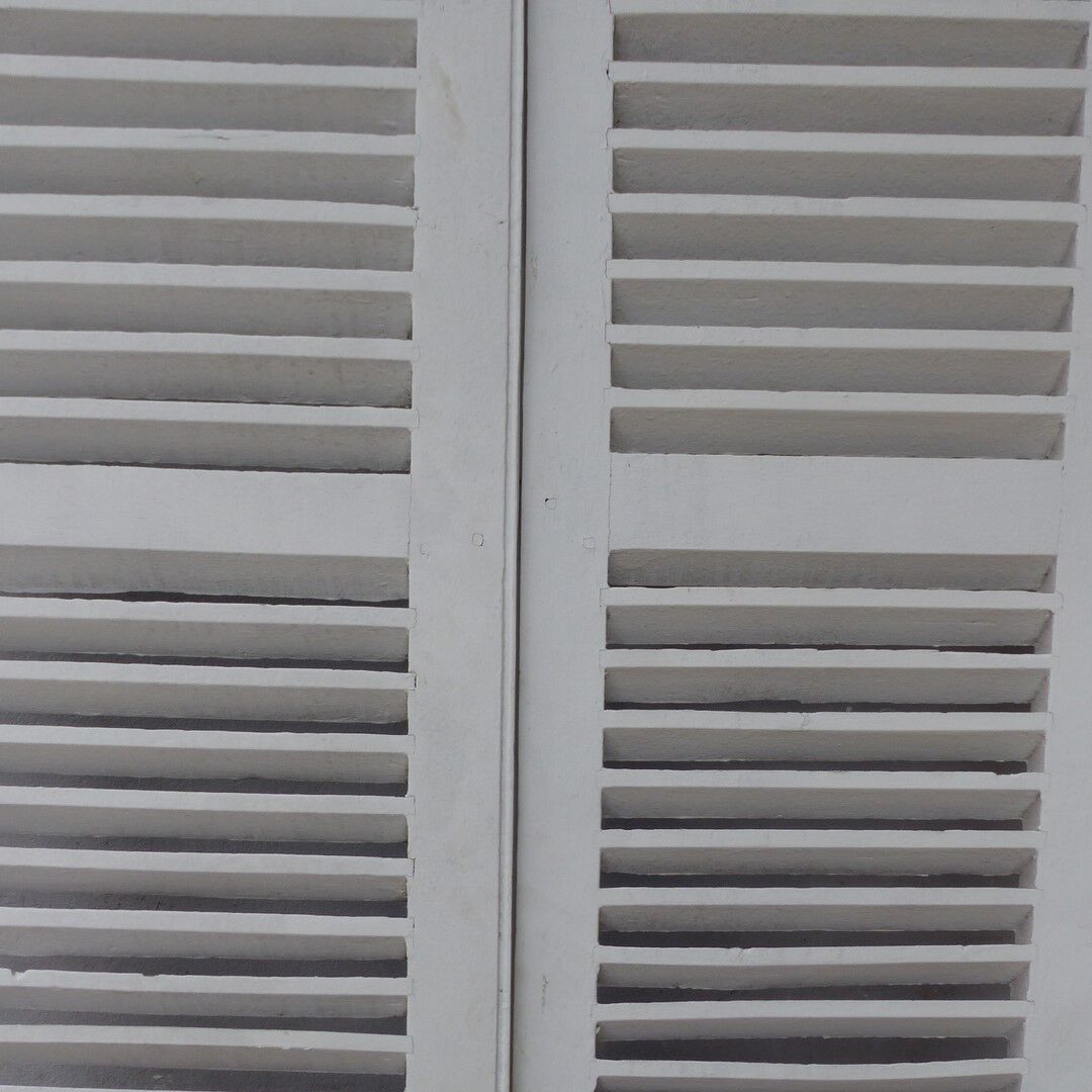 Old wooden shutters louvers 2 leafs