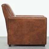 Comfortable and adjustable sheepskin relax armchair with a sleek design