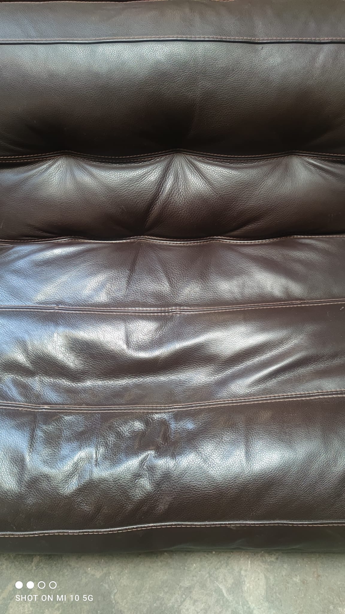 Four-seater sofa in dark brown leather from Steiner by designer Pascal Daveluy, model