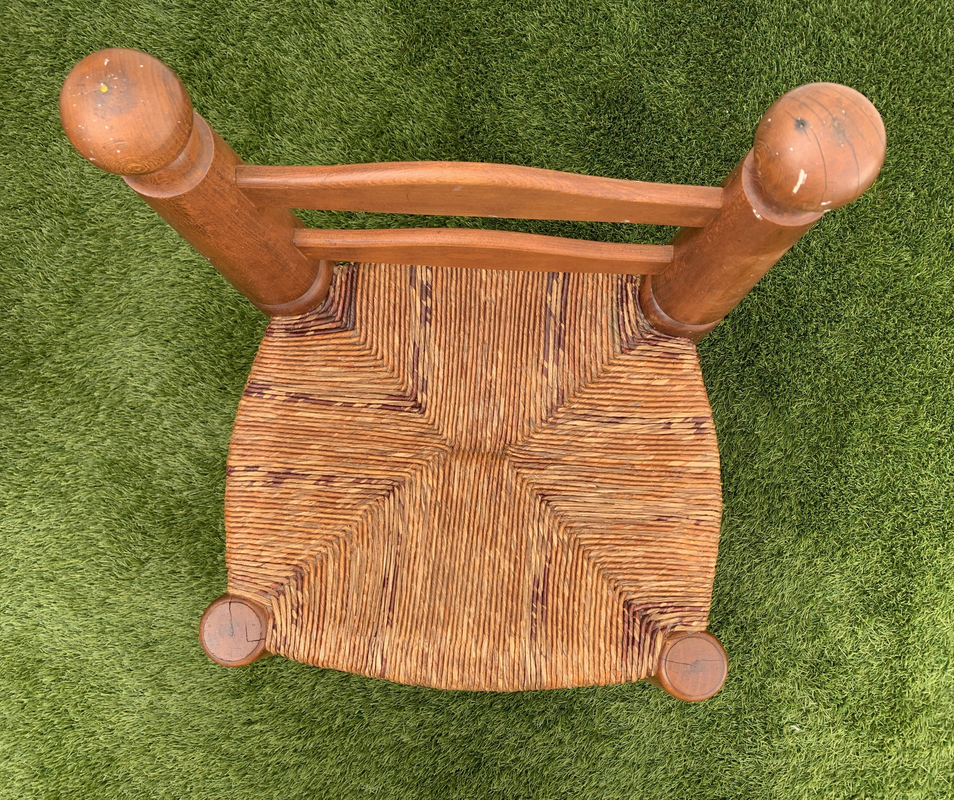 Pair of antique low fire chairs made of wood and straw