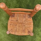 Pair of antique low fire chairs made of wood and straw