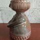 Jacques POUCHAIN (1925-2015) - Dieulefit workshop Anthropomorphic earthenware vase with brown cover. Monogram