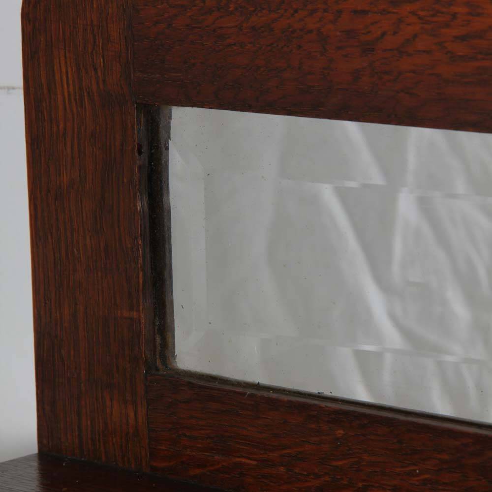 Shelf-shaped mirror, work from the early 20th century.