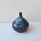 Small blue soliflore vase in glazed ceramic signed X (to be identified)