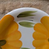 Round serving dish with hand-painted yellow flowers in ceramic TC Italy.