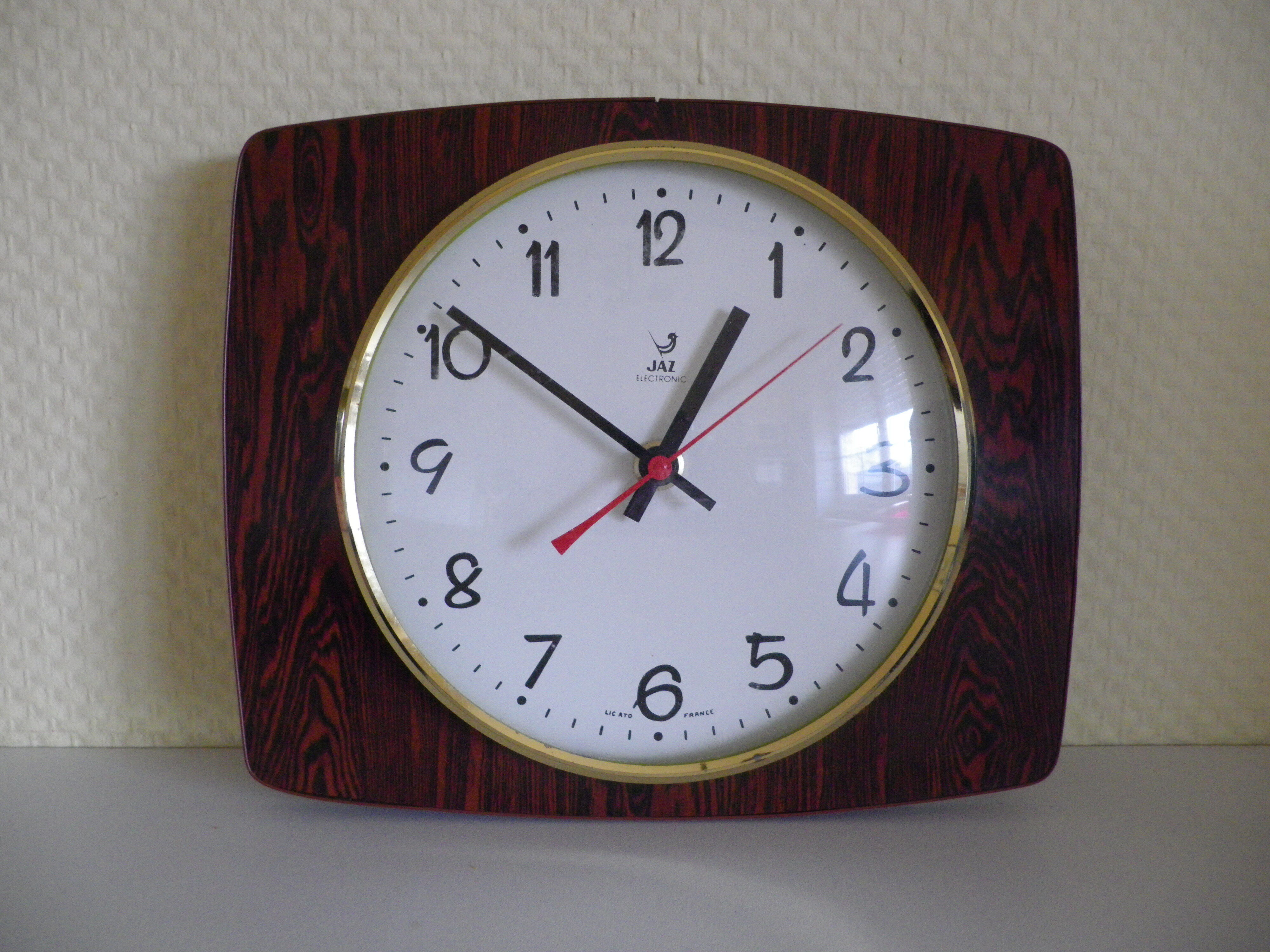 Electronic "Jaz" clock in formica, glass and brass - France - 60s
