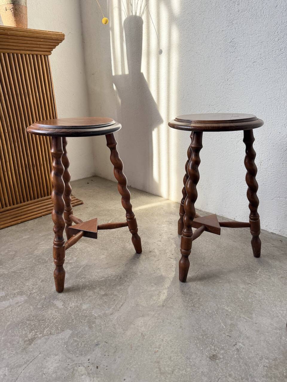 Set of 4 turned oak stools.