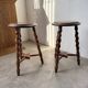 Set of 4 turned oak stools.