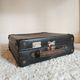 Old blue suitcase the lamp of France radio