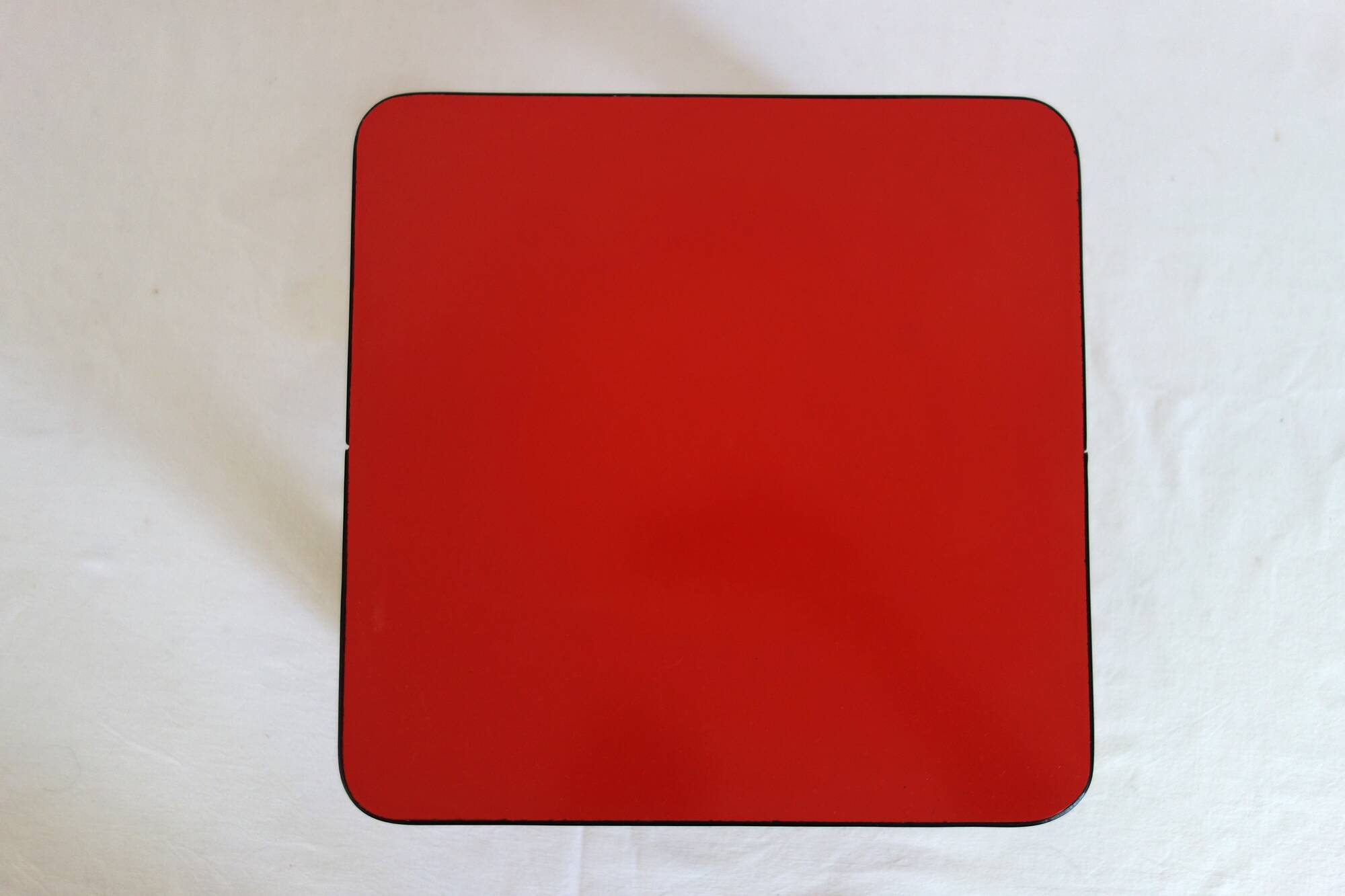 Mini vintage red formica pedestal table or stool