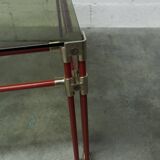 Postmodern Italian design coffee table in smoked glass with red steel structure