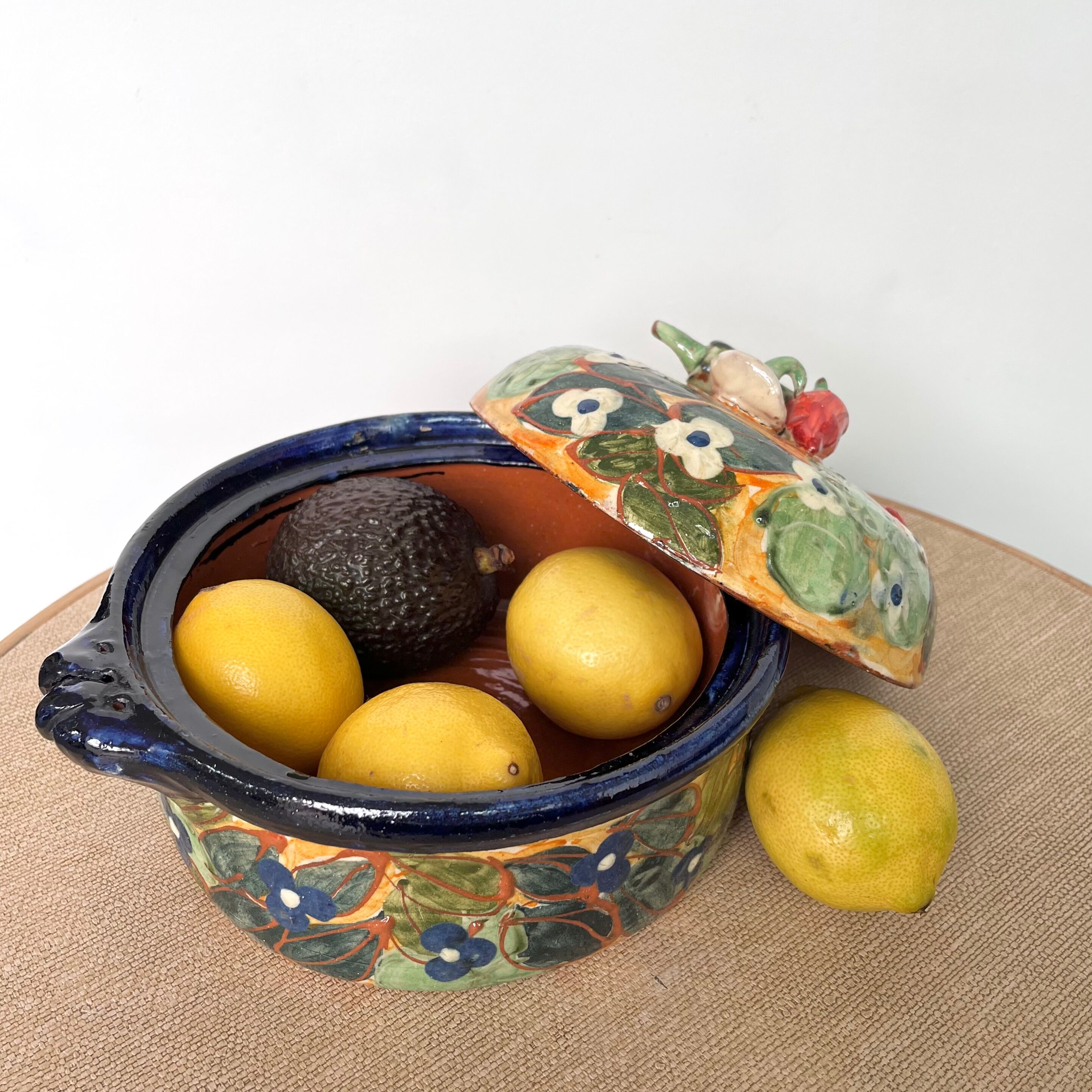 Old vegetable tureen in glazed terracotta