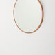 Round mirror in cupper 1960