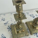 Pair of brass dolphin candlesticks, late 19th century, Napoleonic period
