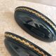 Set of two vintage wall sconces in pine green and gold.