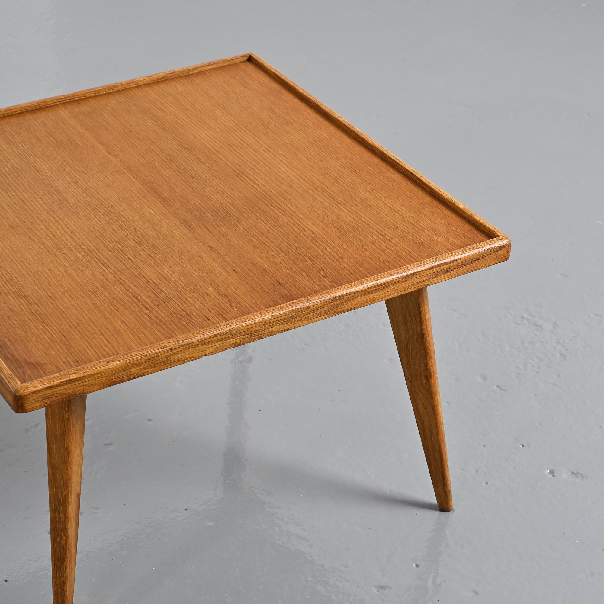 Coffee table with tapered legs, France, circa 1950-1960.
