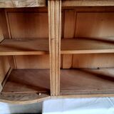 Art-deco wall showcase in raw oak