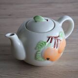 Slush teapot with embossed fruit decoration