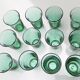 12 vintage Lesieur green glasses.