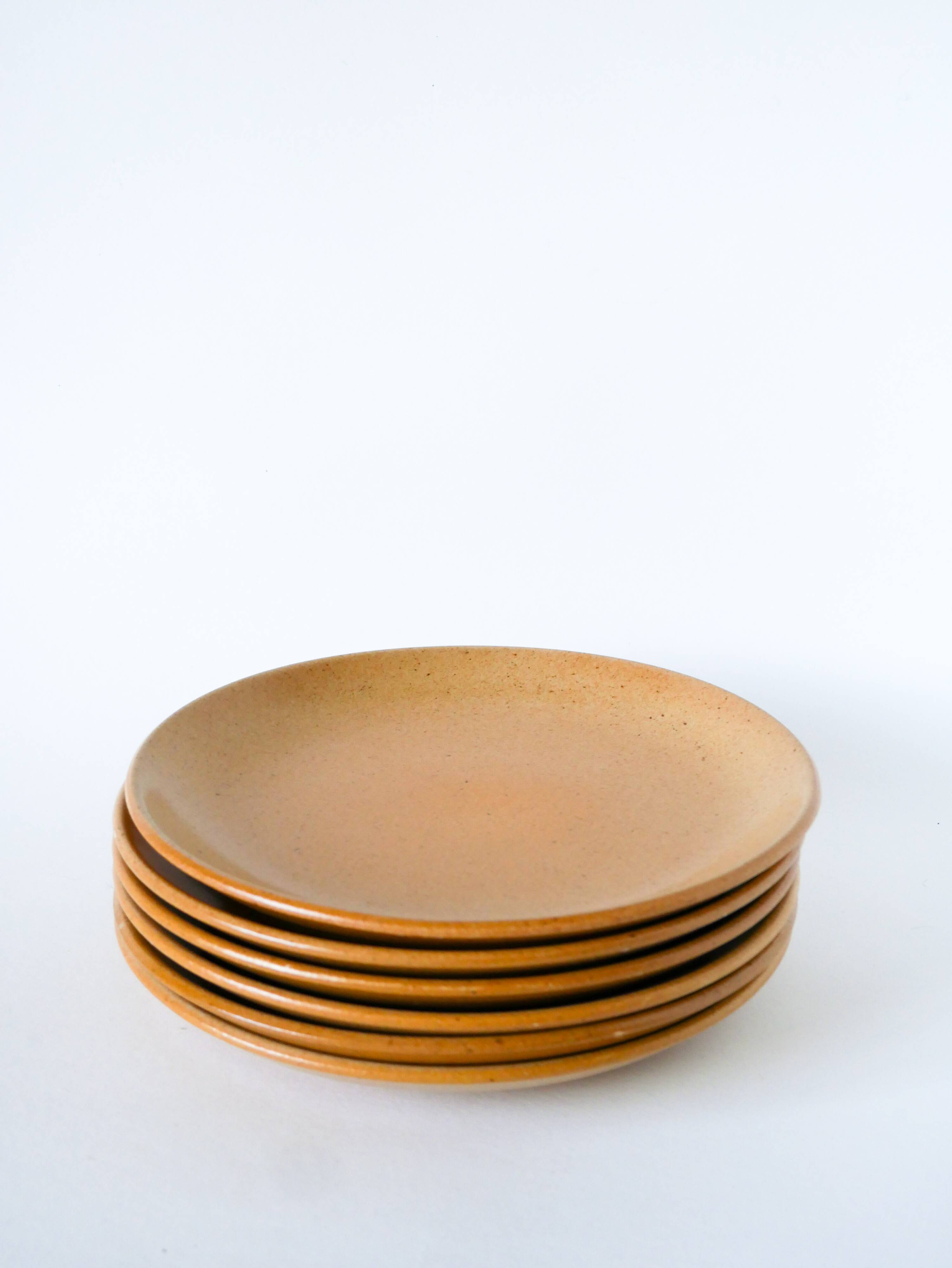 Set of 6 large stoneware plates, 1970 - 24.5 cm