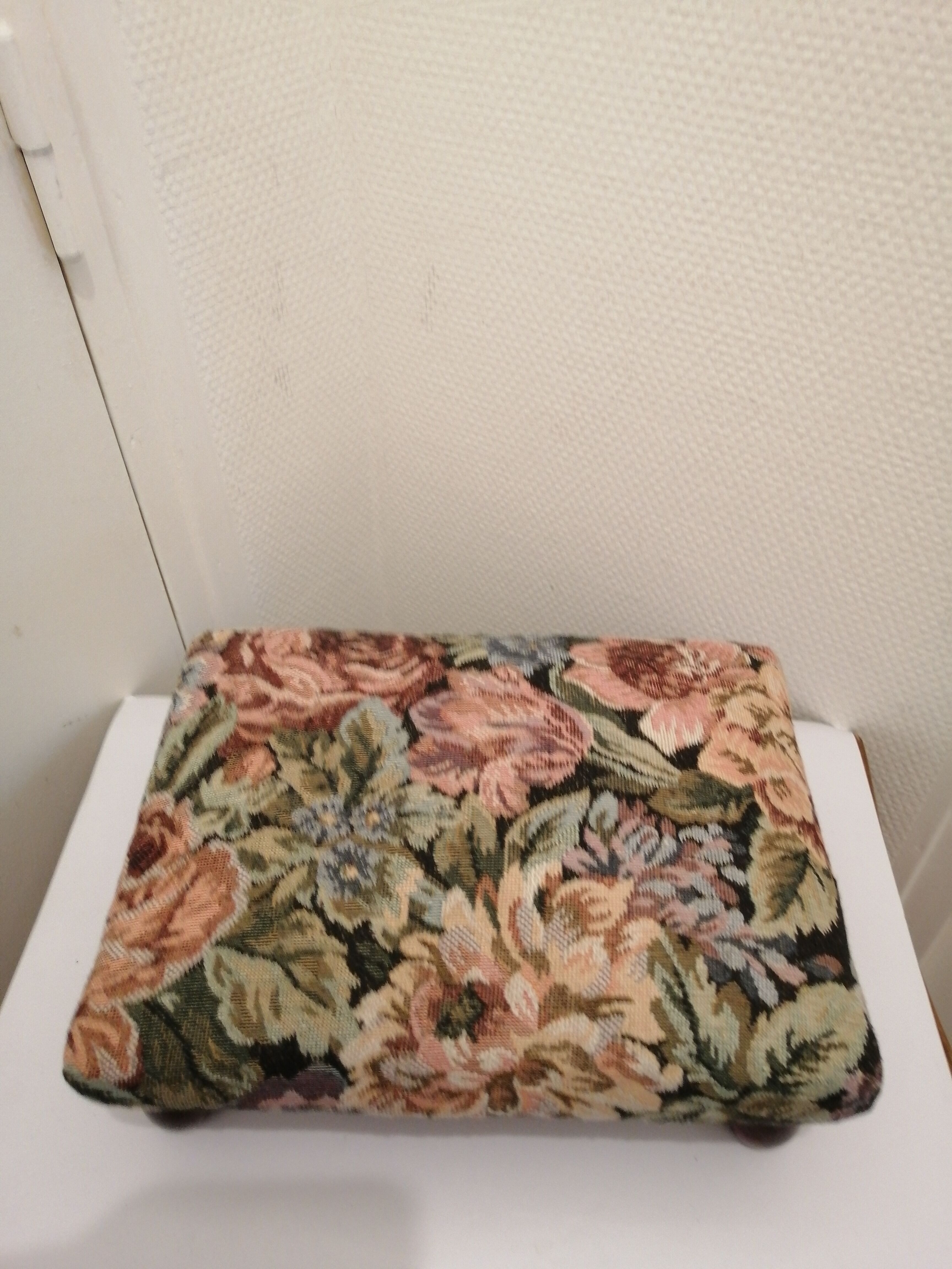 Vintage footrest in wood and fabric