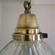Holophane glass suspension and vintage patinated brass