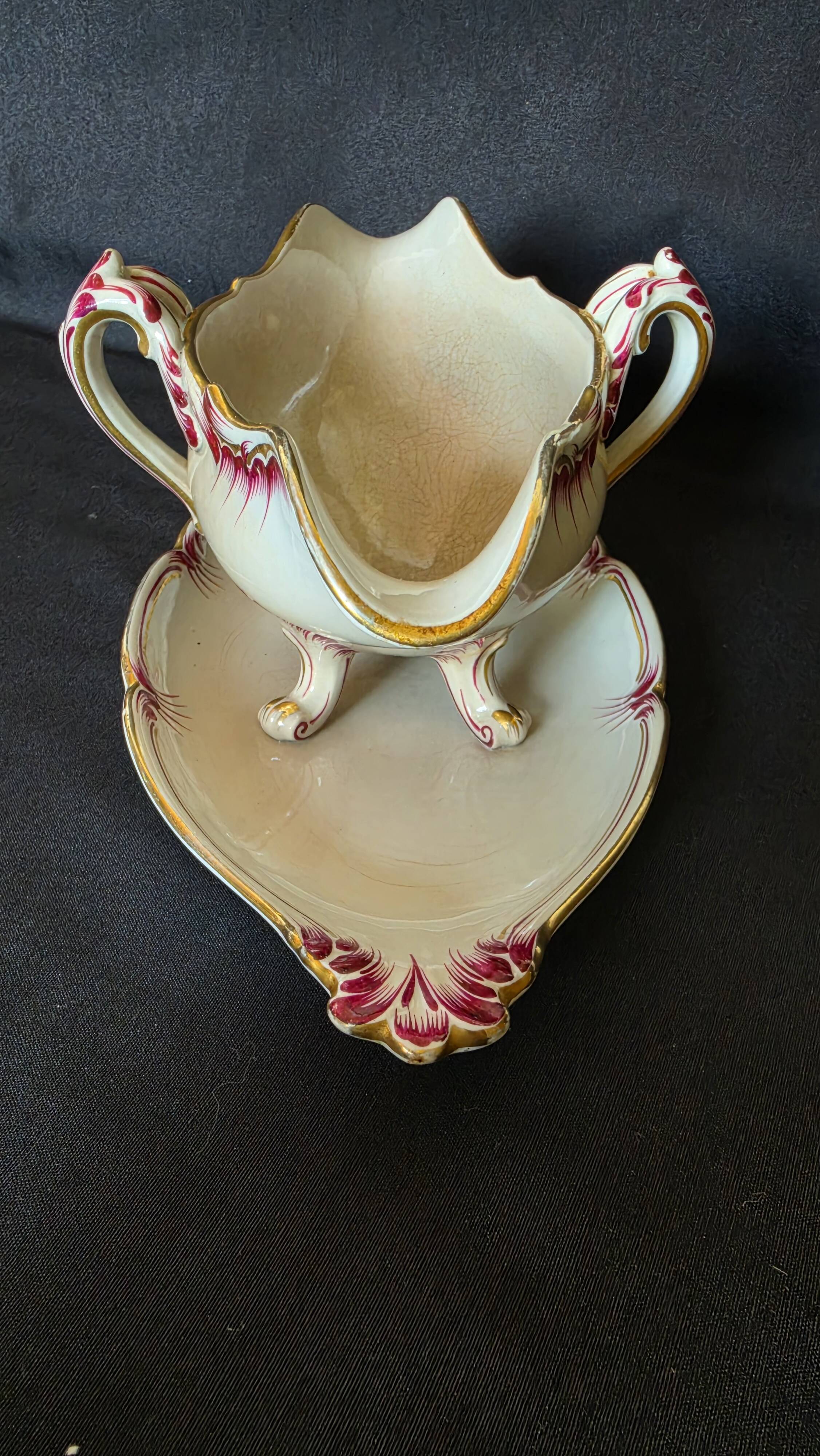 Antique sauce boat in fine earthenware from Sarreguemines, France, neo style.