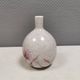 A vase in crackled porcelain with pink decoration. Germany 1930s