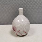 A vase in crackled porcelain with pink decoration. Germany 1930s