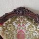 Paire de fauteuils cabriolets de style Louis XV en bois mouluré