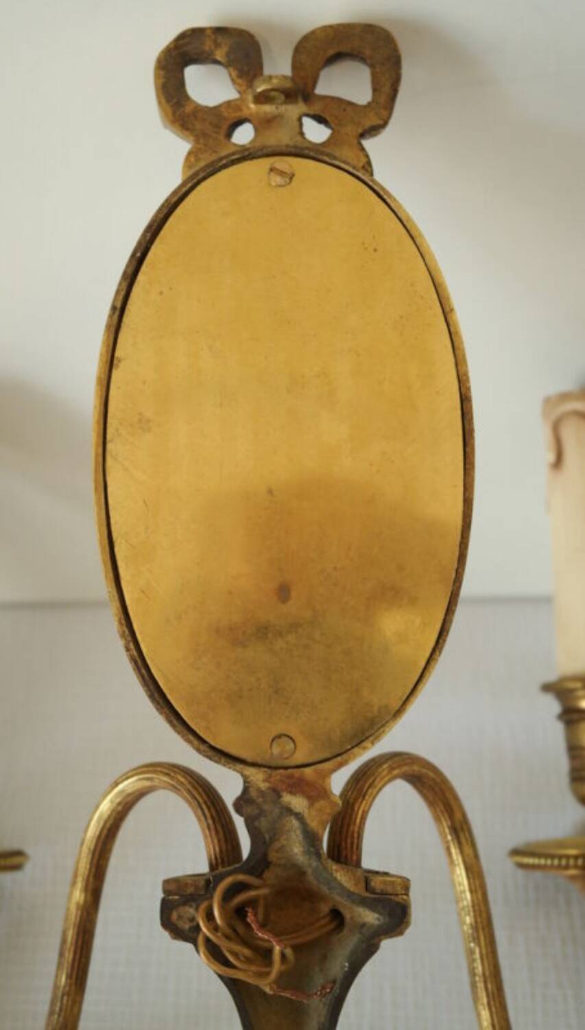 Paire d'appliques en bronze style Louis XVI Lucien Gau