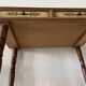 Wooden dressing table with olive green chair and floral patterns