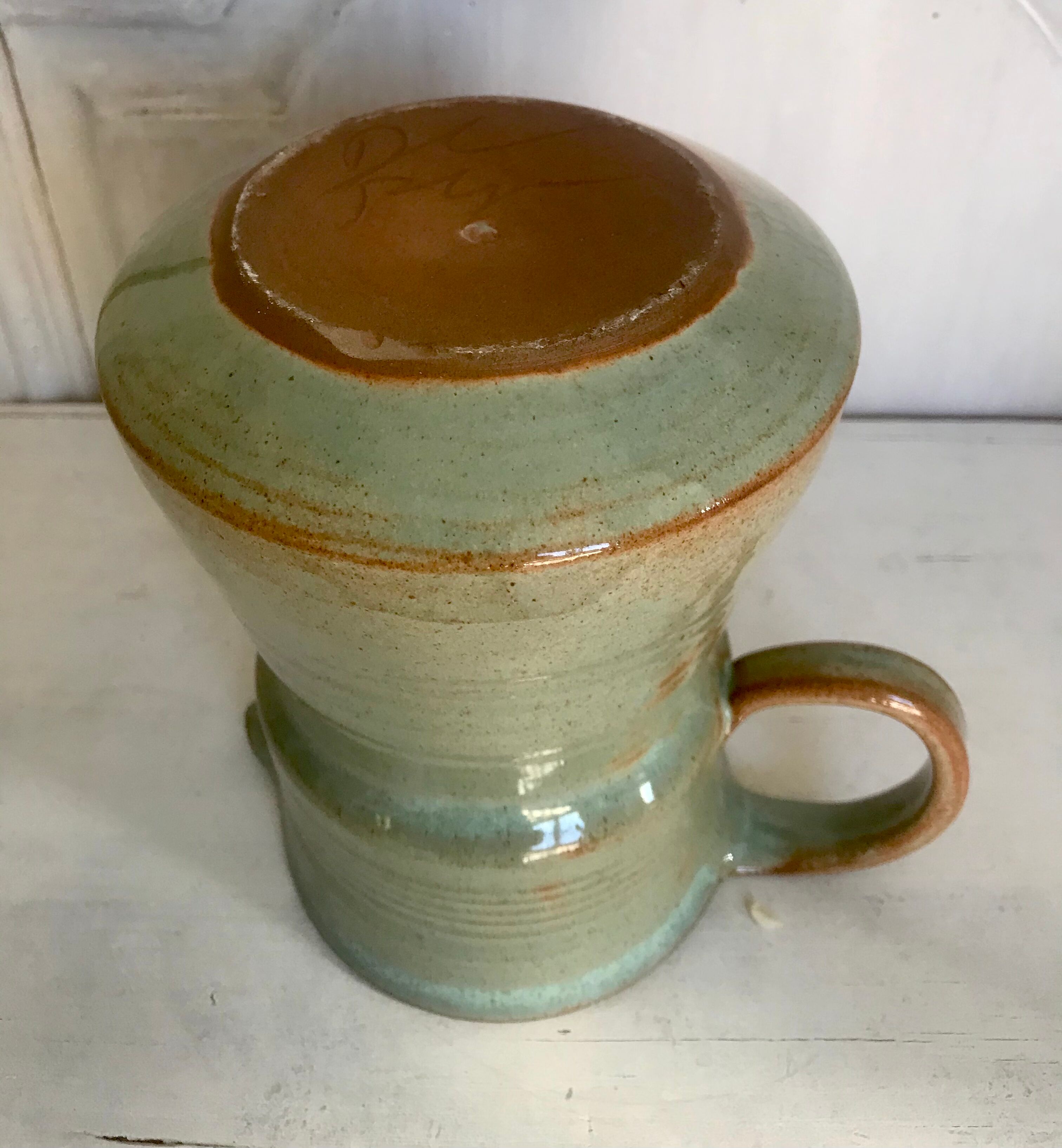 Pitcher and its vintage sandstone glasses