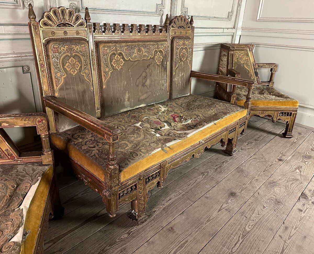 Pair of corner armchairs and an Orientalist bench in carved and polychrome wood from around 1900.