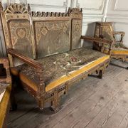 Pair of corner armchairs and an Orientalist bench in carved and polychrome wood from around 1900.