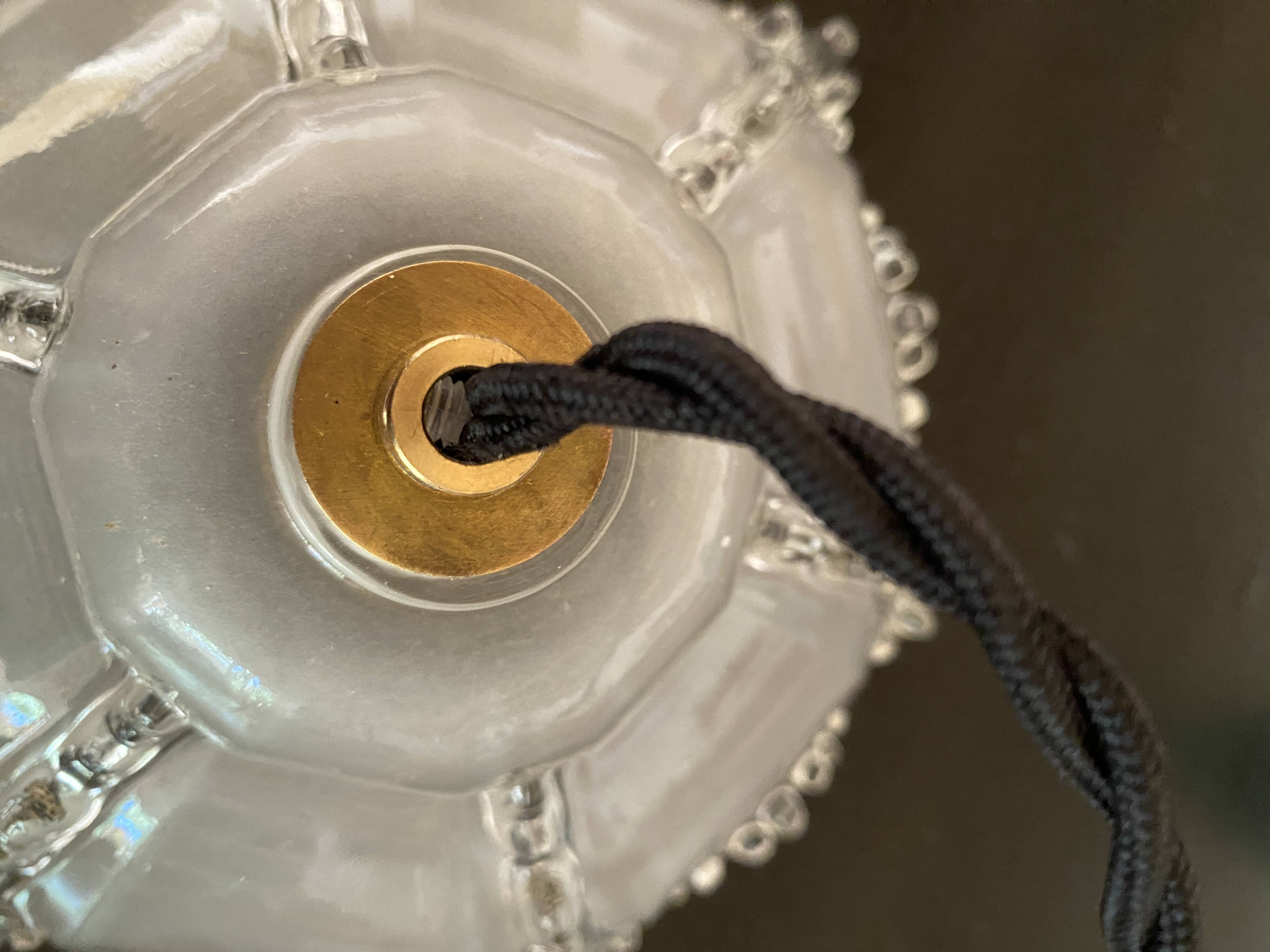 Glass pendant light, braided fabric cable and porcelain ceiling rose