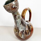 Large bird jug with high neck and handle, signed under the base