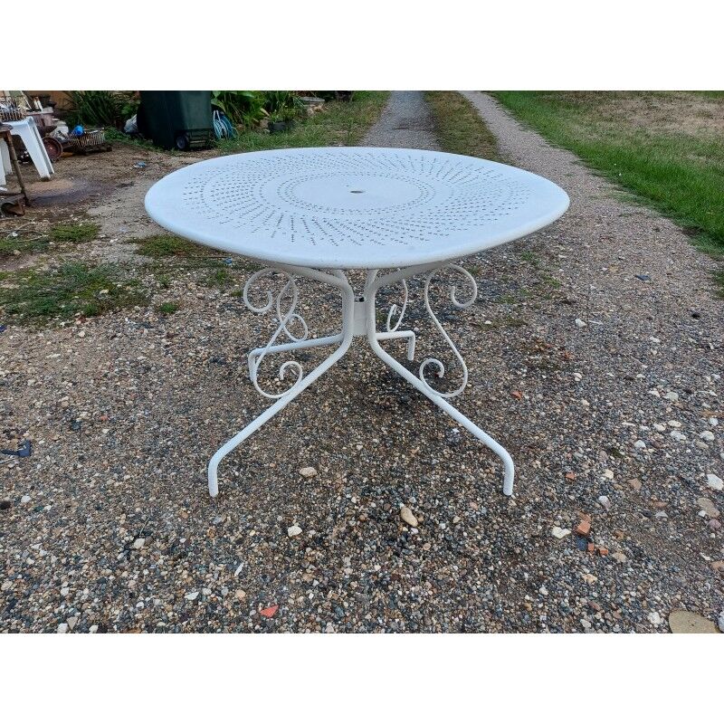 Wrought iron garden table, circa 1900