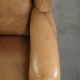 Comfortable cowhide wingback armchair with a timeless English look