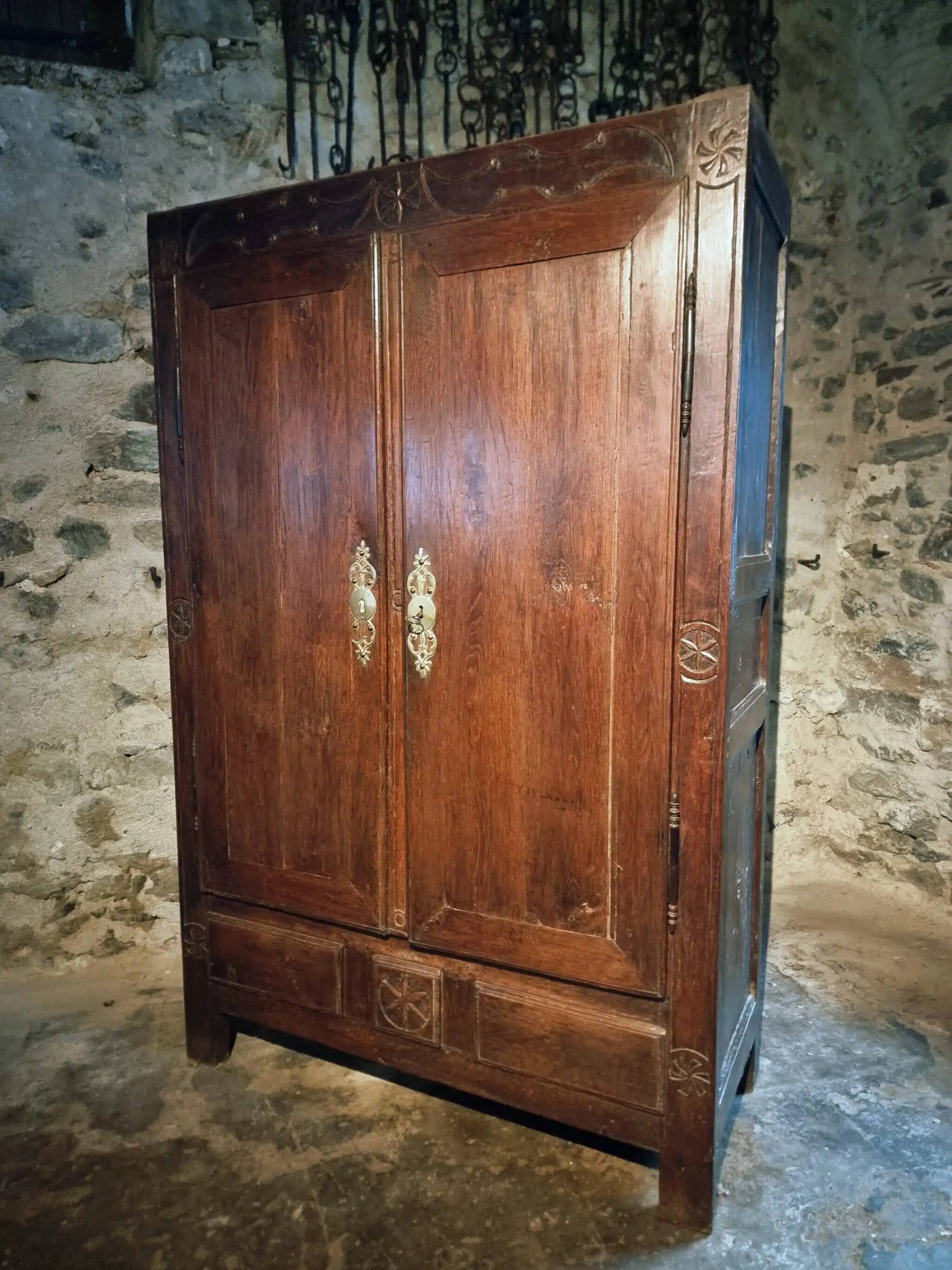 French oak armoire, late 17th - early 18th century, Louis XIV provincial style with hand-carved rosettes