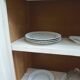 Small vintage buffet reimagined in pearl grey, wooden top.
