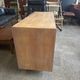 Danish buffet in light oak with sliding door and four drawers.