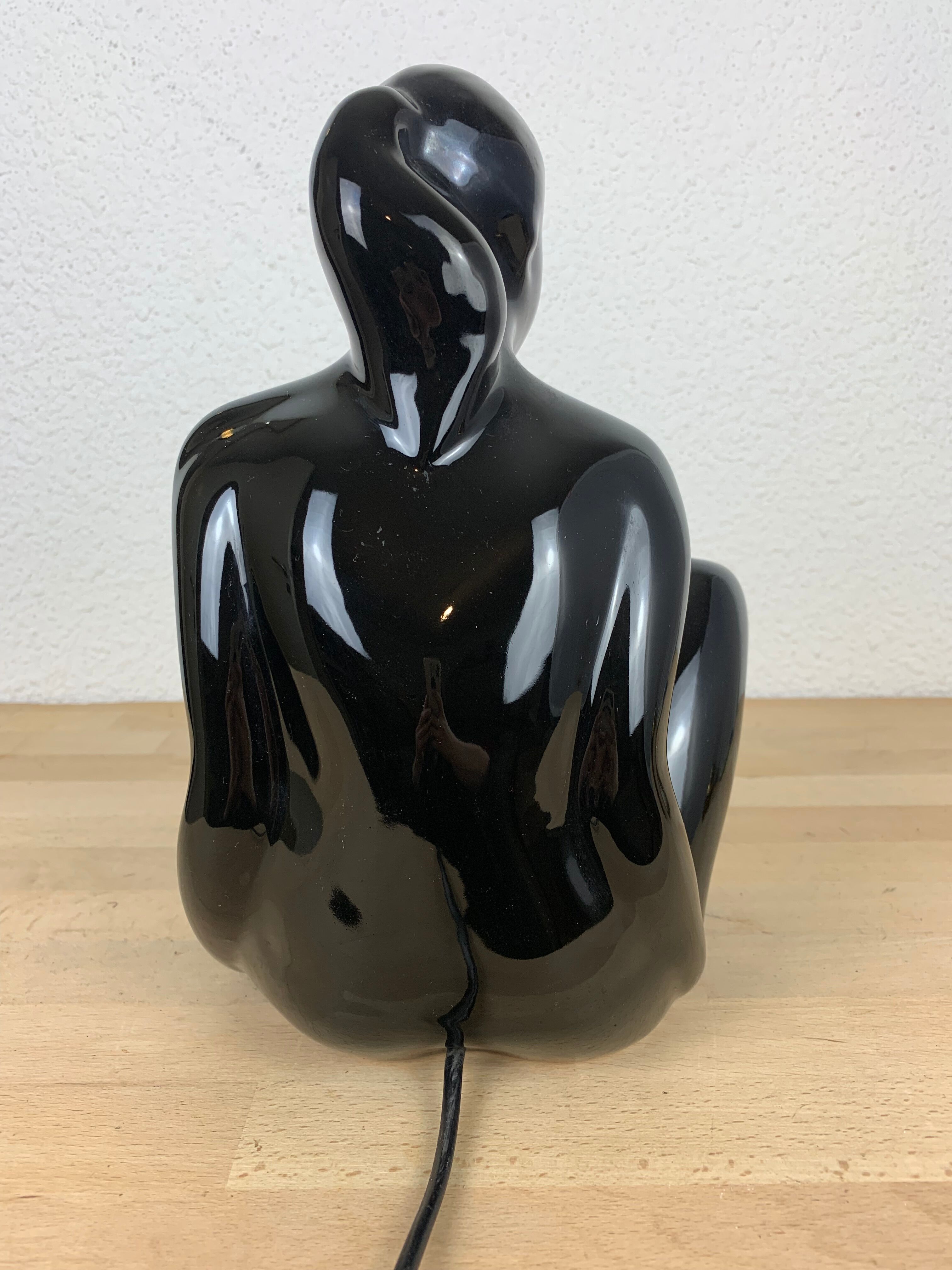 Black ceramic lamp and opal globe